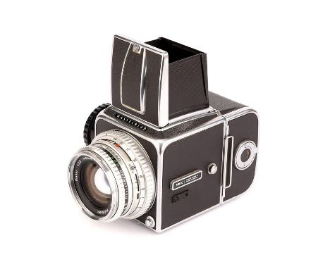 A Hasselblad 500C Medium Format Camera,chrome, serial no. UV121280, with Carl Zeiss Planar f/2.8 80mm lens, chrome, serial no