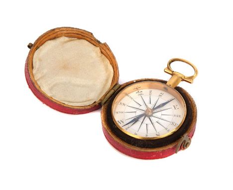 An English Gilt-Brass & Enamel Compass,32 points white enamel compass rose, blued steel needle, in fitted red Morocco case