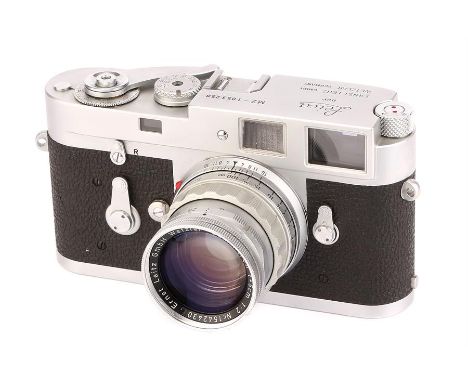 A Leica M2 Rangefinder Camera,1962, chrome, serial no. 1053258, with Leitz Summicron f/2 50mm lens, 1957, 2nd version, chrome