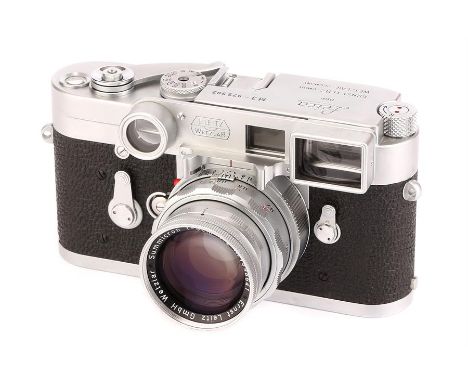 A Leica M3 SS Rangefinder Camera,1959, chrome, serial no. 972592, with Leitz Dual Range Summicron f/2 50mm lens, 1958, chrome