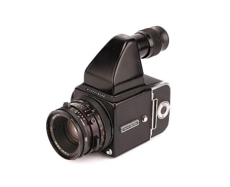 A Hasselblad 500C/M Medium Format Camera,black, serial no. RP1279820, with Carl Zeiss Planar T* CF f/2.8 80mm lens, black, se