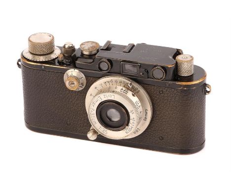 A Leica II Rangefinder Camera,1931, upgraded from a Ia, black, serial no. 65700, with Leitz Elmar f/3.5 35mm lens, nickel, bo