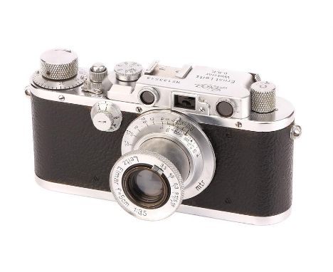 A Leica III Rangefinder Camera,1934, bright chrome, serial no. 133513, with Leitz Elmar f/3.5 50mm lens, chrome, serial no. 4