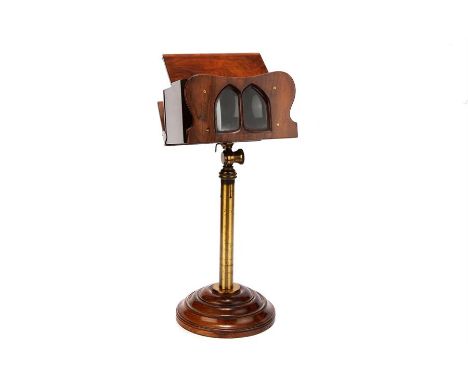 A Cosmorama Pattern Table Stereoscope,C.1860, English, body, VG, on a turned French polished wooden base, with adjustable bra