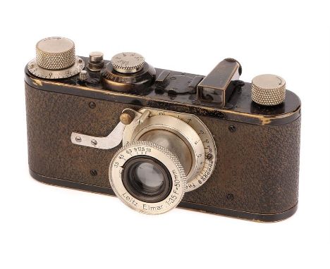 A Leica Model Ia Close Focus Camera,1930, black/nickel, serial no. 35610, with Leitz Elmar f/3.5 50mm lens, nickel, body, G, 