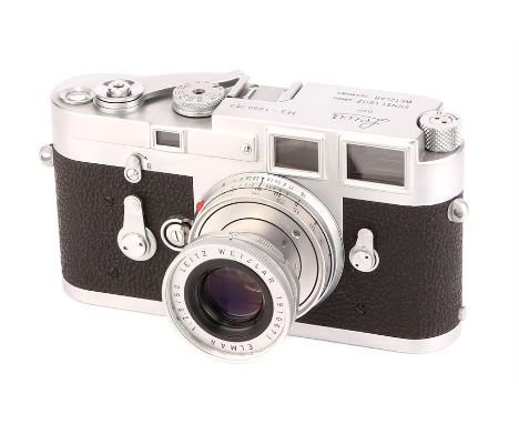 A Leica M3 SS Rangefinder Camera,1960, chrome, serial no. 1000363, with Leitz Elmar f/2.8 50mm lens, 1961, chrome, serial no.