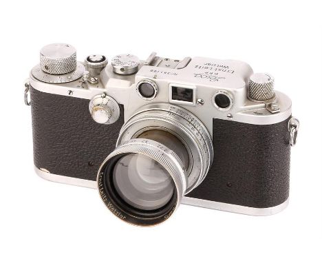 A Leica IIIc Rangefinder Camera,1941/42, chrome, serial no. 381100, with Leitz Summitar f/2 50mm lens, 1940, chrome, serial n