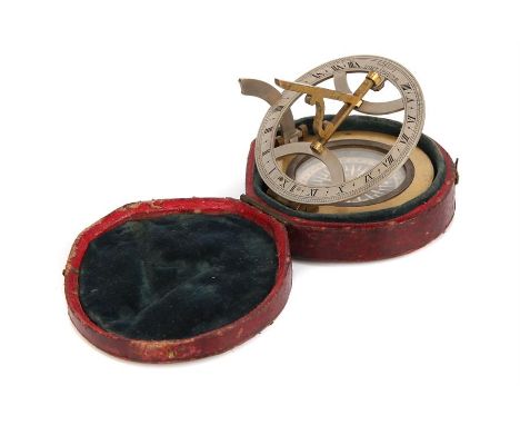 A Pocket Sundial,by Watkins and Hill, including sundial, with floating card compass, in velvet lined red morocco case