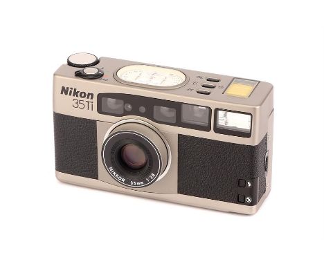 A Nikon 35Ti Compact Camera,titanium, serial no. 5007193, with Nikkor f/2.8 35mm lens, body, E, untested, lens, E, with instr