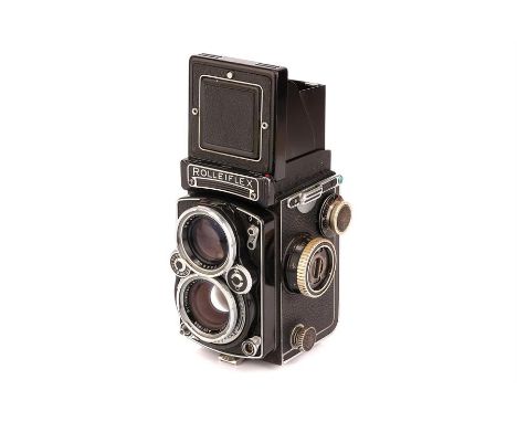 A Rollei Rolleiflex 2.8E TLR Medium Format Camera,black, serial no. 1634702, with Schneider Xenotar f/2.8 80mm lens, serial n