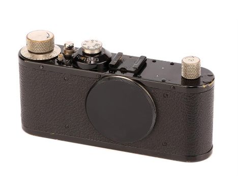 A Leica Standard Model E Body,1934, black, serial no. 145611, body, VG, shutter working, lacking finder, with maker's body ca
