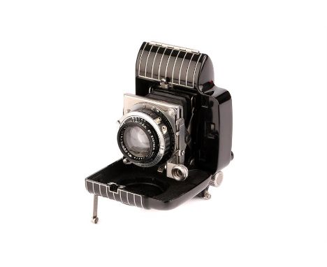 A Kodak Bantam Special Rangefinder Camera,black, serial no. 2070, with Kodak Ektar f/2 45mm lens, serial no. 19215, body, E, 