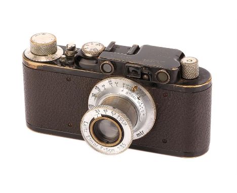 A Leica III Rangefinder Camera,1928, upgraded from a Ia, black, serial no. 12123, with Leitz Elmar f/3.5 50mm lens, 1939, chr