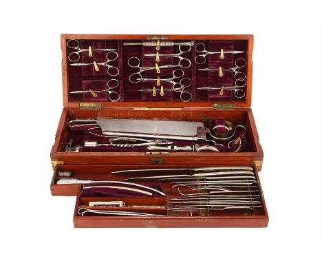 A British Army Field Surgeon's Surgical Set,in brass bound mahogany case labelled 'Arnold & Sons London', approximately 43 in