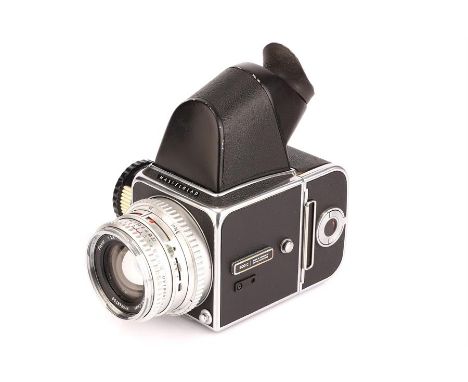 A Hasselblad 500C Medium Format Camera,chrome, serial no. UH124367, with Carl Zeiss Planar f/2.8 80mm lens, chrome, serial no