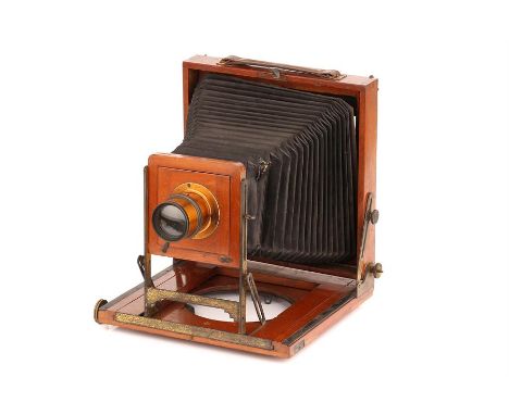 A J. Lancaster Kamret Whole Plate Mahogany Field Camera,with unmarked f/8 brass lens, body, G, lens, VG, complete with four D