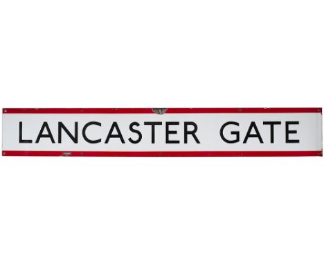 London Underground enamel frieze sign LANCASTER GATE measuring 60in x 9in. In very good condition with one face chip.