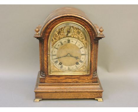 A Victorian oak cased striking mantle clock, by Camerer Cuss & Co, Oxford Street