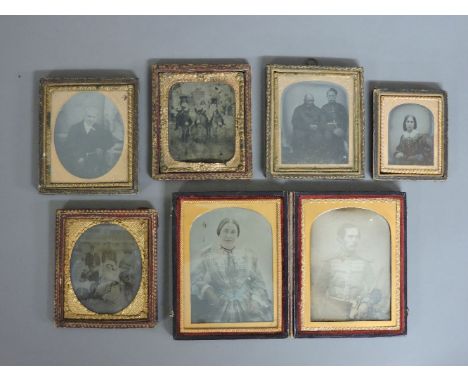 Six Victorian ambrotypes, mostly portraits, one double mounted of a military officer holding a clarinet and his wife, and a t