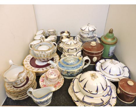 An 1830s pattern number 6469H part teaset, a bone china tea set, with a claret ground and vine borders, a blue and white prin