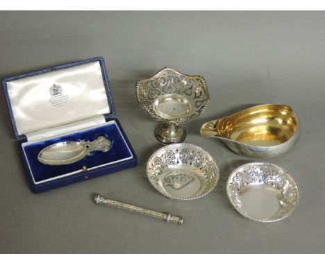 A silver sauce boat, a Victorian propelling pencil, a pair of pierced dishes, a pierced stand, and an Asprey's silver Prince 