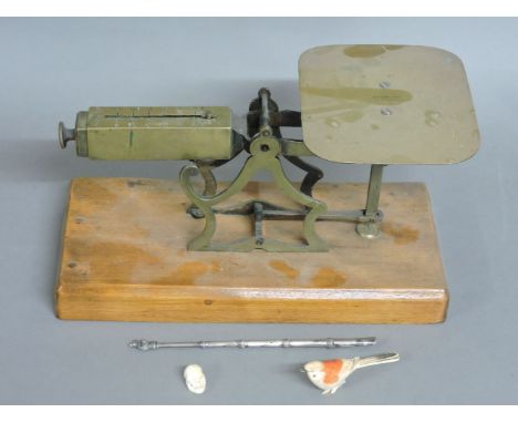 A set of 19th century brass postal scales, by Windle &amp; Blyth, a Chinese pen, and two other items
