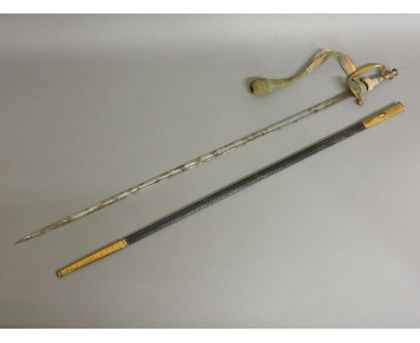 An Imperial German officer's sword and scabbard, with sword knot and engraved blade, 95cm long