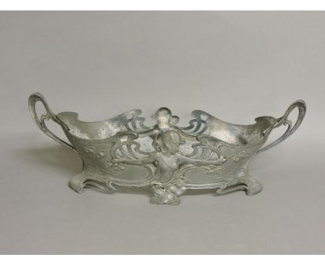A WMF pewter planter, pierced both sides with a female, stamped marks, 46.5cm long