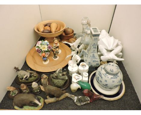 A collection of items including Nao figures, Geobel figures, carved fruit, Country Artist's figures, etc