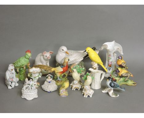 A collection of Royal Worcester and other birds, a pottery seagull and a pig, a cornucopia shaped candlestick , etc