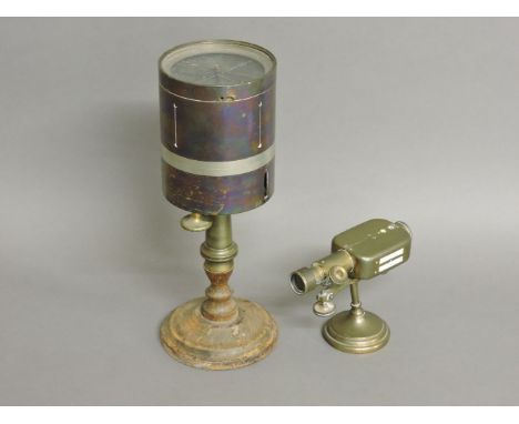 Two brass scientific instruments, a surveying cross, with compass and vernier scale on wooden stand, 25cm high, and a sightin