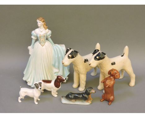 A Royal Worcester figure 'Olivia', three Beswicks Dogs, A Branksome Dog, and a pair of pottery dogs