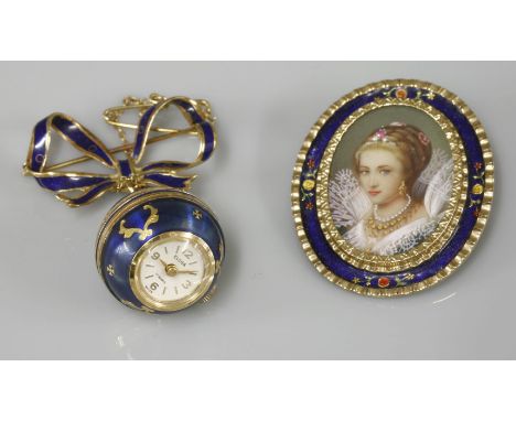 A gold plated enamel globe pendant watch, by Eloga, suspended on a blue enamel bow/fob brooch, together with an 18ct gold han