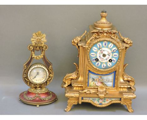 A Continental porcelain and gilt metal mounted clock, and a smaller French example