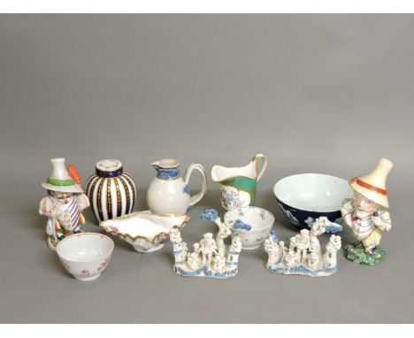 A Worcester powder blue ground bowl, repaired, a Chinese export cream jug, a pair of monkey ornaments, two Mansion House dwar