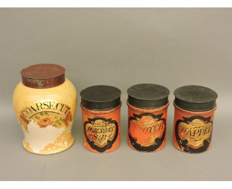 Four ceramic tobacco storage jars, with tin lids