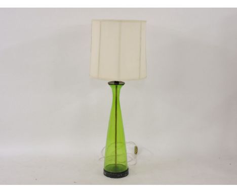 A large 1960s green glass floor lamp
