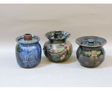 Three Elton 'Sunflower' pottery barrels and covers, one commemorating Edward VII's coronation, 1909, with a raised 'EVII' and