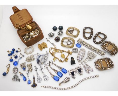 A Halley's comet brooch, circa 1835, a pair of Trifari blue and clear gem dress clips, vintage Victorian and earlier buckles 