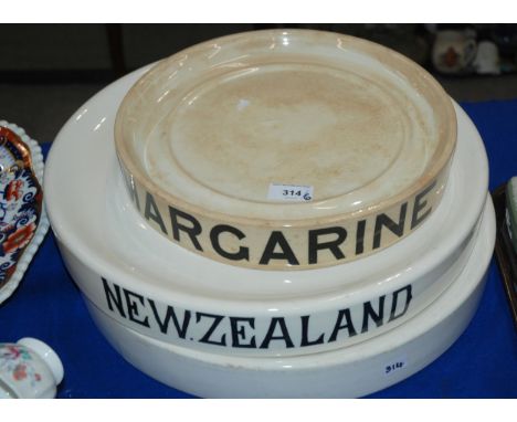 A Smith and Stevenson 'New Zealand' grocers shop display stand, a plain example, a Wedgwood 'Margarine' stand, two pottery wa