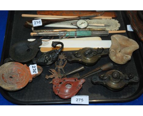 An antique oil lamp with a snail finial, another with a rat, a soapstone lamp, and assorted other items Condition Report:Avai