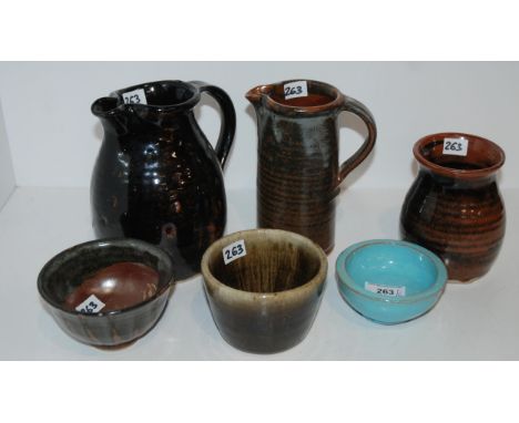 Three John Leach Muchelney pottery pieces, a blue glazed bowl stamped Marshall and two other studio pottery pieces Condition 