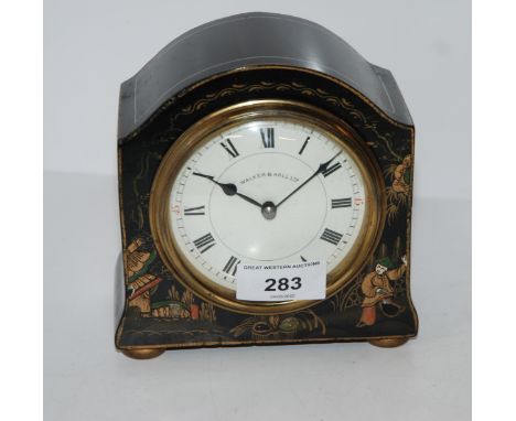 A black lacquered mantle clock with French movement retailed by Walker and Hall Condition Report:Available upon request