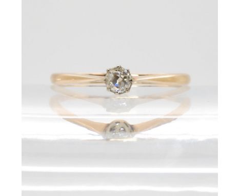 An 18ct gold old cut diamond solitaire ring, set with estimated approx 0.16cts, finger size O1/2, weight 1.4gms Condition Rep