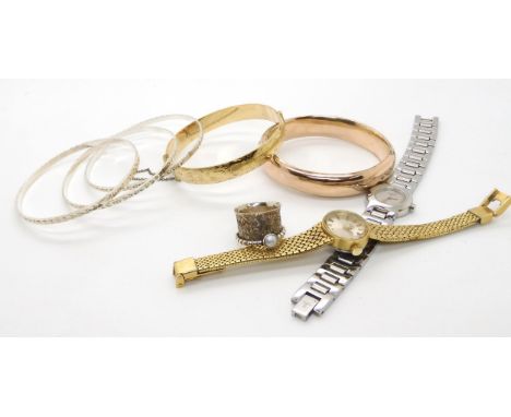 Silver and gold plated bangles, watches and a silver ring Condition Report:Condition report not available for this lot.