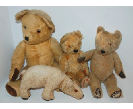 A vintage Teddy bear, two other Teddy bears and a polar bear soft toy, 55cm high and smaller (4) Condition Report:Available u