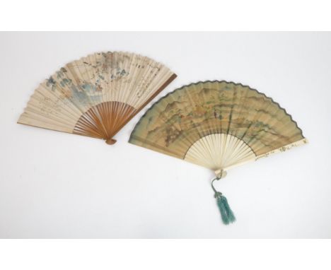 A JAPANESE OGI FAN the double leaf painted with figures beneath a mountainous field, the reverse with sprays of flowers, moun