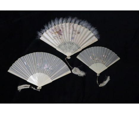 A CHINESE EXPORT EMBROIDERED FAN the marabou topped satin leaf embroidered with a dragon amongst clouds chasing a flaming pea