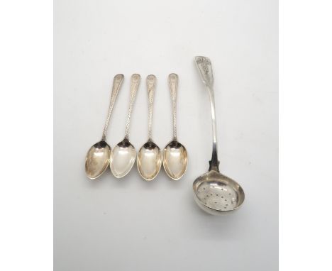 A Scottish provincial fiddle pattern silver sifting ladle, probably later chased to the terminal, by David Greig, Perth, C.18