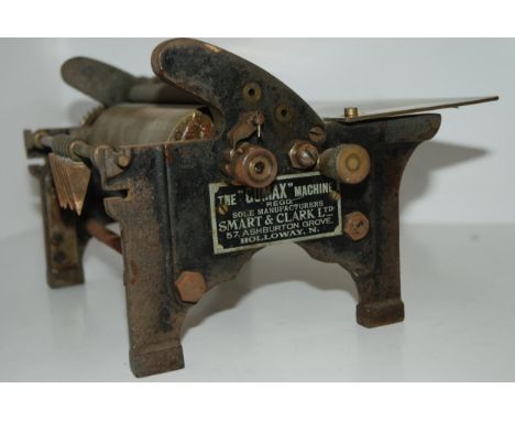 A vintage brass Gumax machine, 30cm wide Condition Report:Available upon request